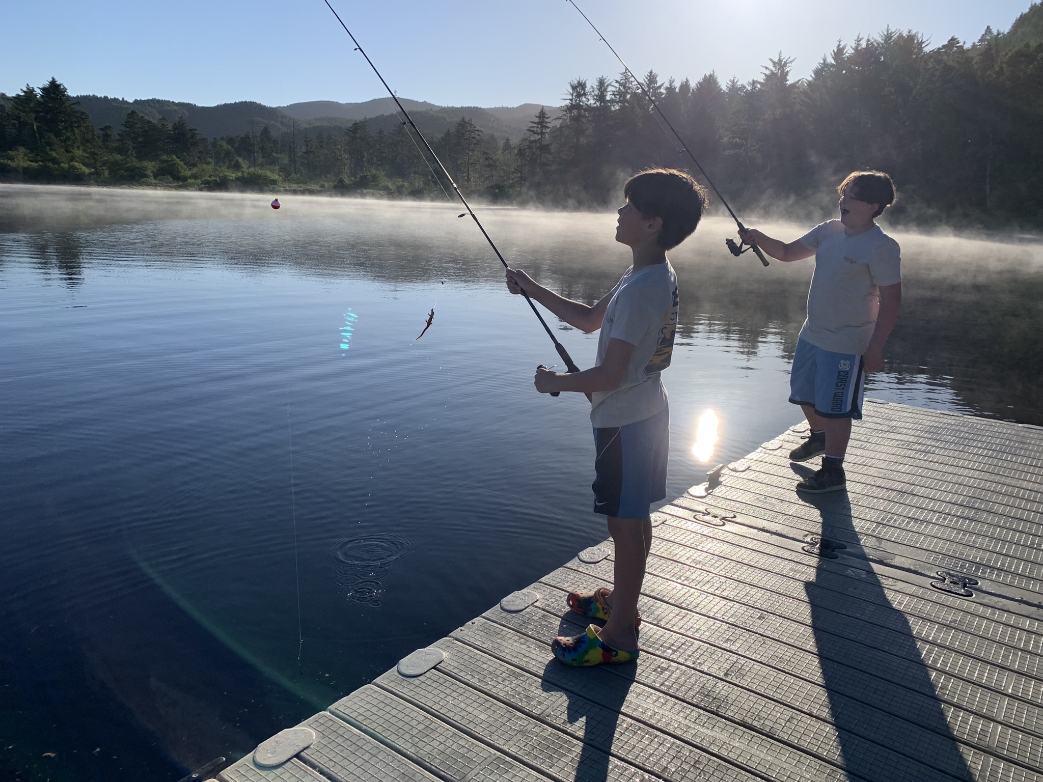 boys fishing on the lake