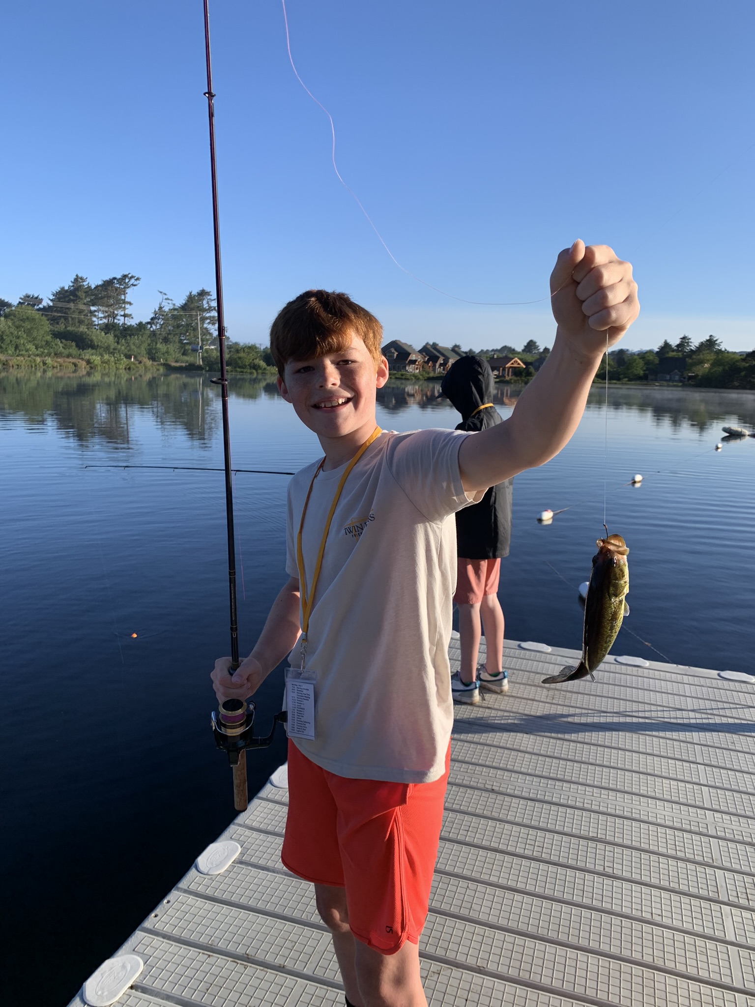 boy catches a fish